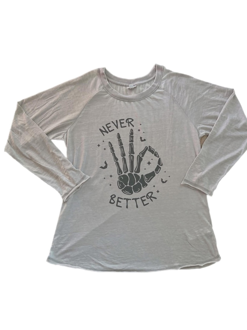 LuLaRoe Julie Cream Graphic Long-Sleeve Tee - 'Never Better' Skeleton Hand